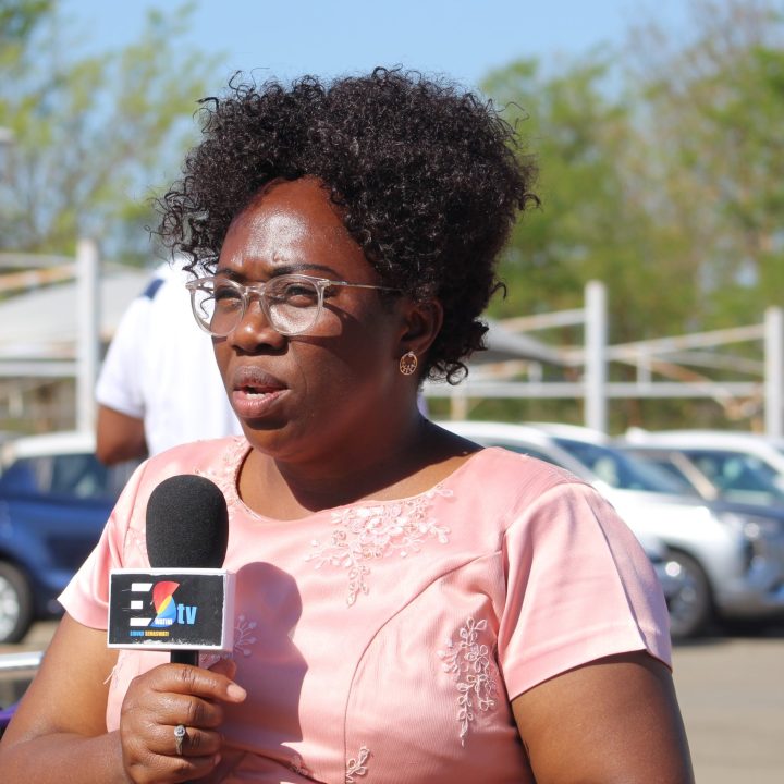 Mrs. Tryphinah Mvubu having a moment with Eswatini TV's staff.